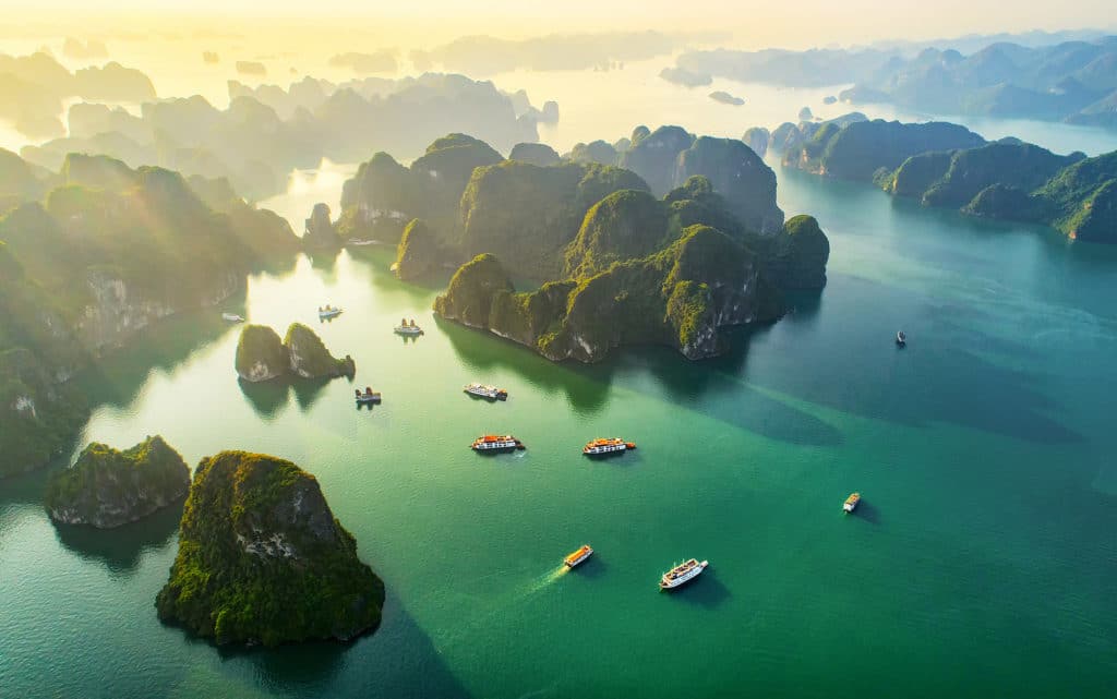 Day 8 - shutterstock - 1218765286_VIETNAM_Aerial view floating fishing village and rock island, Halong Bay, Vietnam