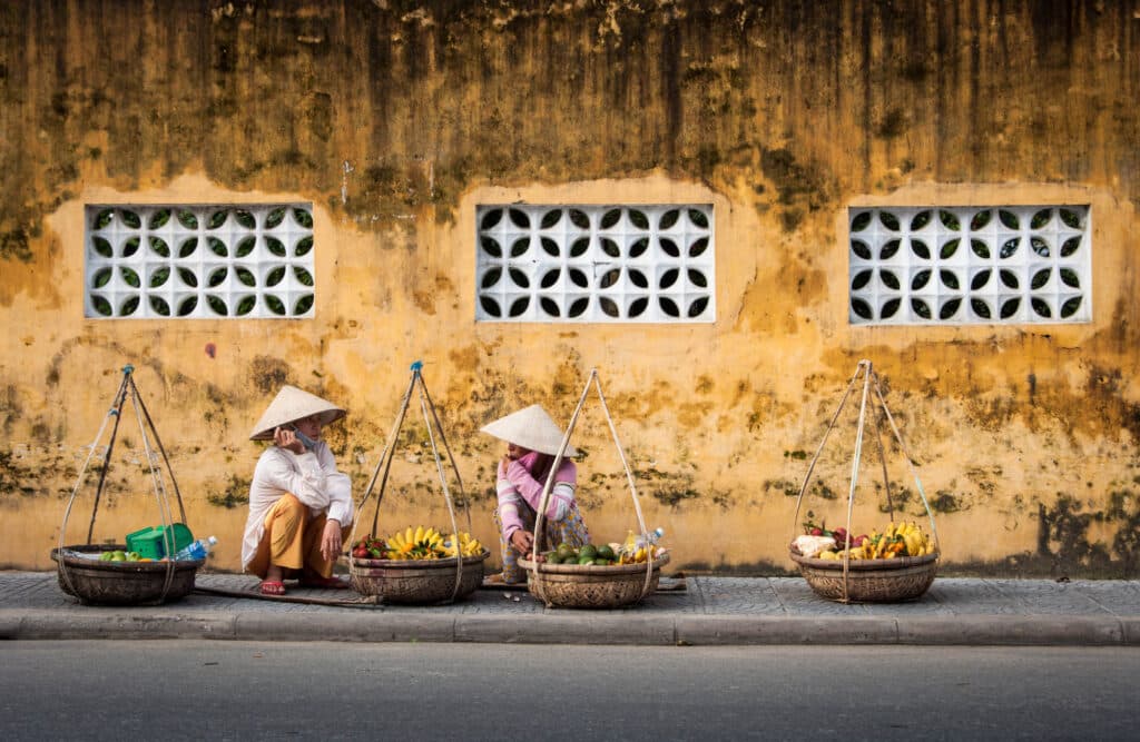 00 INTRO image local Vietnamese women street vendor in Hoi An on December 7, 2011 in Hoi An, Vietnam